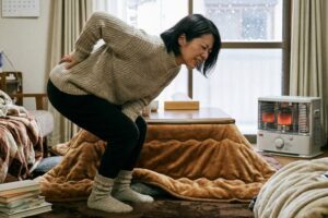 腰痛　冬　女性